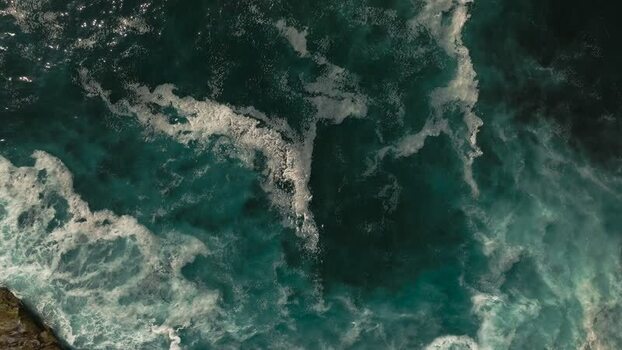 Aerial view of crashing waves at La Jolla Cove United States.