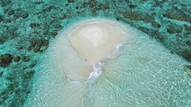 Aerial view of a white sandbank in turquoise coral reef waters Maldives. Aerial view of a white sandbank in turquoise coral reef waters Maldives.