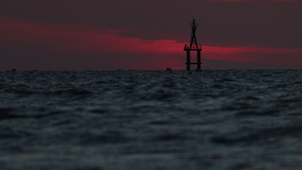View of a navigational beacon at sea France.