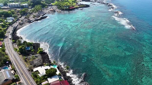 Aerial view of Kahaluu Beach Park and the turquoise coastline United States.