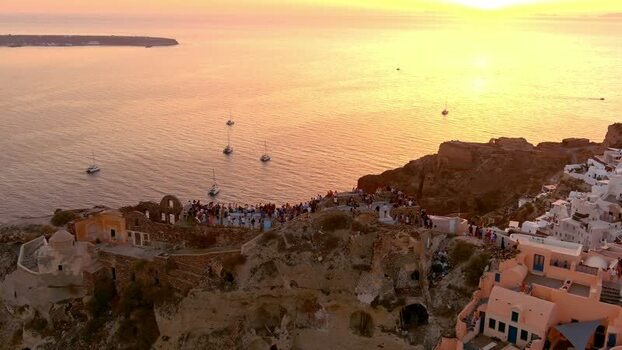 Aerial view of Santorini sunset over the Aegean Sea Greece. Aerial view of Santorini sunset over the Aegean Sea Greece.