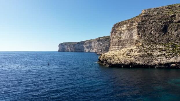 Aerial view of Xlendi cliffs and the Mediterranean Sea Malta. Aerial view of Xlendi cliffs and the Mediterranean Sea Malta.