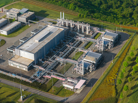 Aerial view of the UGS Damborice facility with industrial infrastructure complex pipelines and storage tanks surrounded by green fields in Damborice South Moravian Region Czechia. Aerial view of the UGS Damborice facility with industrial infrastructure complex pipelines and storage tanks surrounded by green fields in Damborice South Moravian Region Czechia.