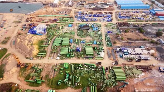 Aerial view of desalination plant construction site in India. Aerial view of desalination plant construction site in India.