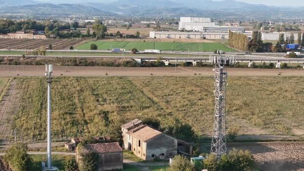 Aerial view of telecommunication towers near motorways Italy. Aerial view of telecommunication towers near motorways Italy.