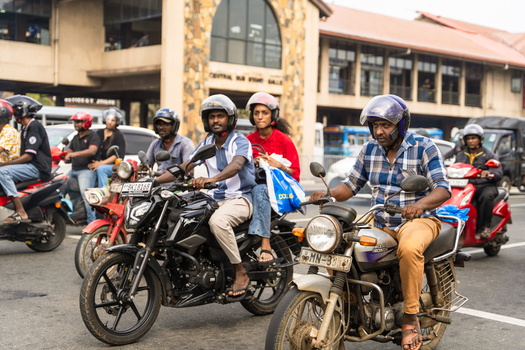 Galle Sri Lanka 07 January 2026 View of people riding motorcycles and scooters in front of the Central Bus Stand in Galle.