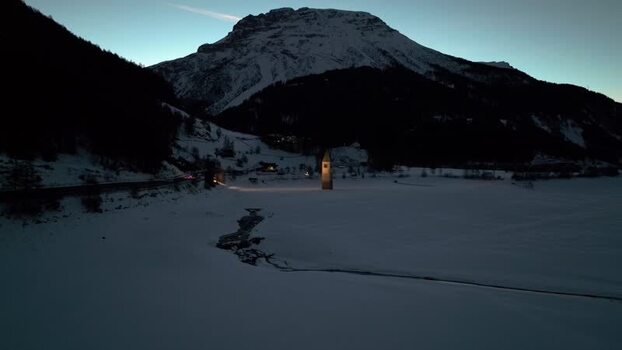 Aerial view of the submerged church tower in Graun im Vinschgau Italy. Aerial view of the submerged church tower in Graun im Vinschgau Italy.