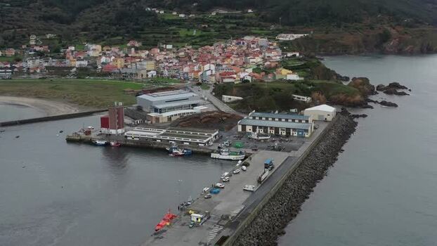 Aerial view of the harbor and coastal town of Carino Spain. Aerial view of the harbor and coastal town of Carino Spain.