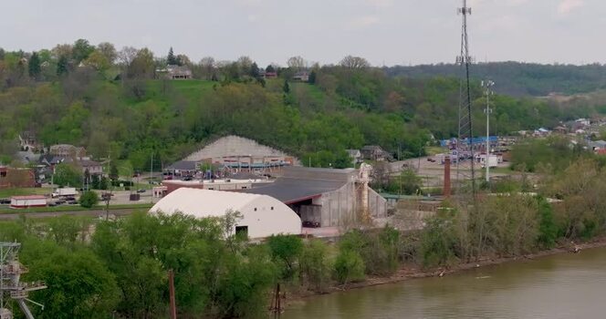 Aerial view of industrial buildings along the river United States. Aerial view of industrial buildings along the river United States.