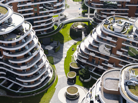 Aerial view of modern residential buildings with curved balconies green roofs and a landscaped courtyard in Krakow Lesser Poland Voivode Poland.