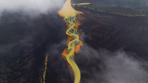 Aerial view of a winding glacial river in volcanic plains Iceland. Aerial view of a winding glacial river in volcanic plains Iceland.