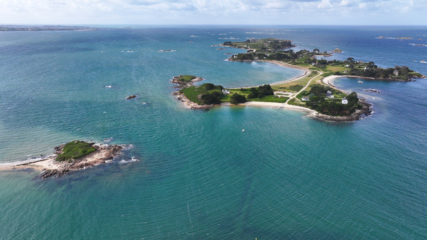 Aerial view of the coastline and islands with sandy beaches and turquoise waters in Carantec Brittany France. Aerial view of the coastline and islands with sandy beaches and turquoise waters in Carantec Brittany France.