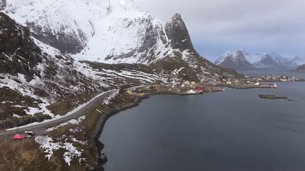 Aerial view of Lofoten mountains and coastal road Norway.