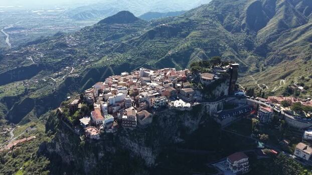 Aerial view of the hilltop village of Castelmola Italy. Aerial view of the hilltop village of Castelmola Italy.