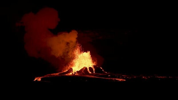 View of volcano eruption at night United States. View of volcano eruption at night United States.