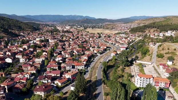 Aerial view of Velingrad town with red roofed houses Bulgaria.