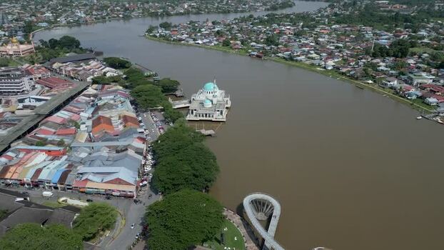 Aerial view of Sarawak River and Floating Mosque Malaysia. Aerial view of Sarawak River and Floating Mosque Malaysia.