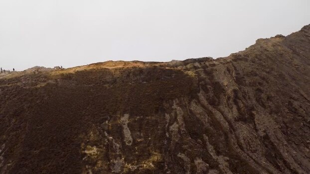Aerial view of people standing on the rim of Erta Ale Volcano Ethiopia. Aerial view of people standing on the rim of Erta Ale Volcano Ethiopia.