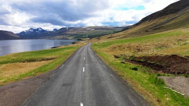 Aerial view of the road along Hvalfjordur fjord Iceland. Aerial view of the road along Hvalfjordur fjord Iceland.