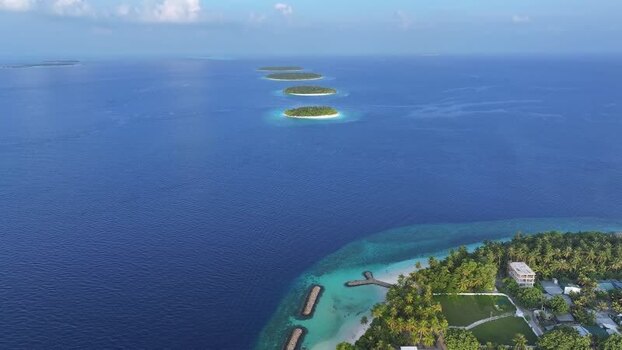Aerial view of tropical islands in the Maldives. Aerial view of tropical islands in the Maldives.