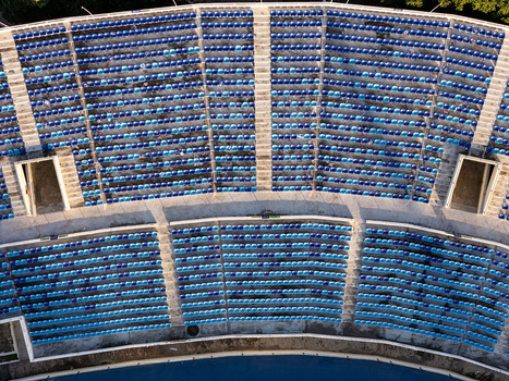 Aerial view of the blue seating rows of an outdoor amphitheater in Santo Domingo Distrito Nacional Dominican Republic.