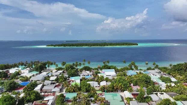 Aerial view of Maalhos village and tropical islands Maldives. Aerial view of Maalhos village and tropical islands Maldives.