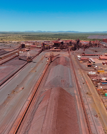 Aerial view of a large scale mining operation with vast stockpiles of mineral rich material industrial infrastructure and conveyor systems in Thabazimbi Limpopo South Africa. Aerial view of a large scale mining operation with vast stockpiles of mineral rich material industrial infrastructure and conveyor systems in Thabazimbi Limpopo South Africa.