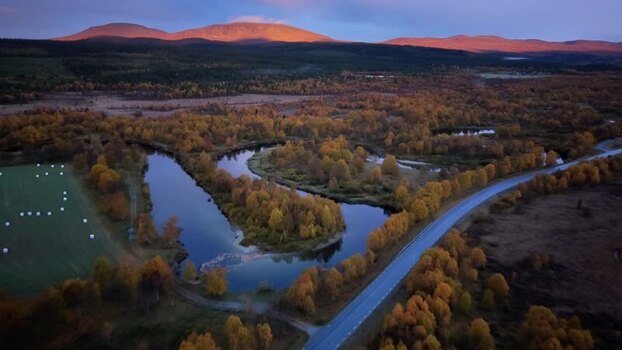 Aerial view of Ljusnan river at sunrise in Funasdalen Sweden.