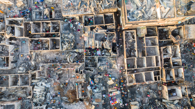 Aerial view of the stark ruins and debris strewn landscape where structures once stood tall now a mosaic of gray and white amid the bustling activity Dhaka Dhaka Division Bangladesh. Aerial view of the stark ruins and debris strewn landscape where structures once stood tall now a mosaic of gray and white amid the bustling activity Dhaka Dhaka Division Bangladesh.