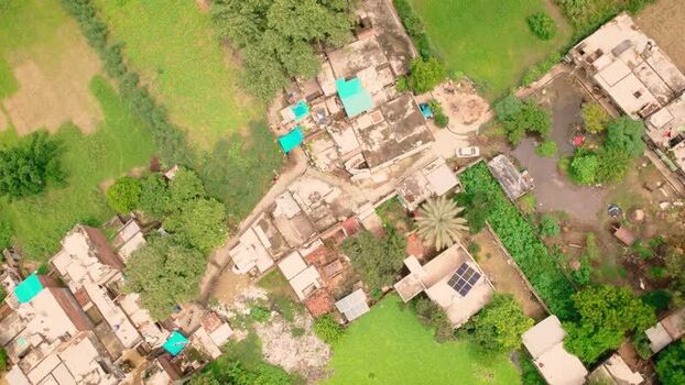 Aerial view of solar panels on rooftops in Lucknow India.
