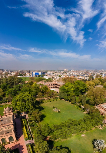 Aerial view of Islamia College University Peshawar featuring historic architecture lush green lawns and surrounding urban landscape in Peshawar Khyber Pakhtunkhwa Pakistan. Aerial view of Islamia College University Peshawar featuring historic architecture lush green lawns and surrounding urban landscape in Peshawar Khyber Pakhtunkhwa Pakistan.