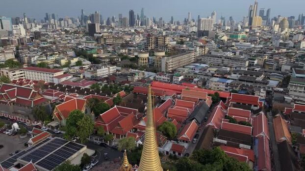 Aerial view of Wat Saket temple and Bangkok skyline Thailand.