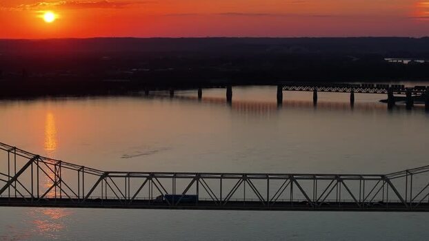Aerial view of a bridge over the Ohio River at sunset United States. Aerial view of a bridge over the Ohio River at sunset United States.