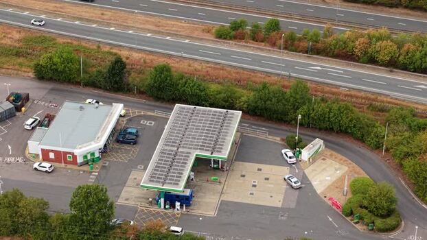 Aerial view of a petrol station with solar panels United Kingdom.