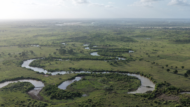Aerial view of the meandering River Sabaki flowing through the lush green landscape of Malindi Kilifi County Kenya.