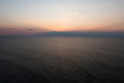 Aerial view of the sunset over the Atlantic Ocean at Asbury Park Beach in Asbury Park New Jersey United States.