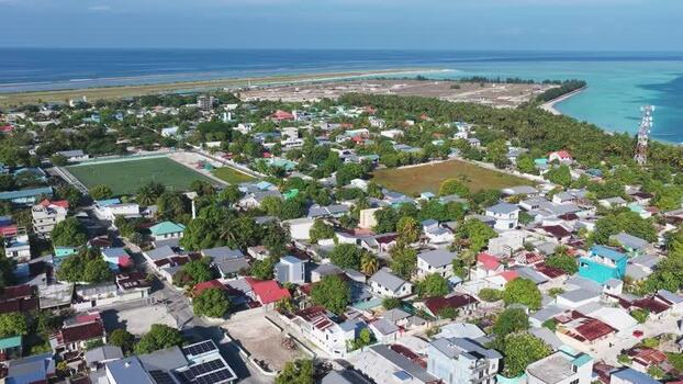 Aerial view of the island town of Kudahuvadhoo Maldives. Aerial view of the island town of Kudahuvadhoo Maldives.