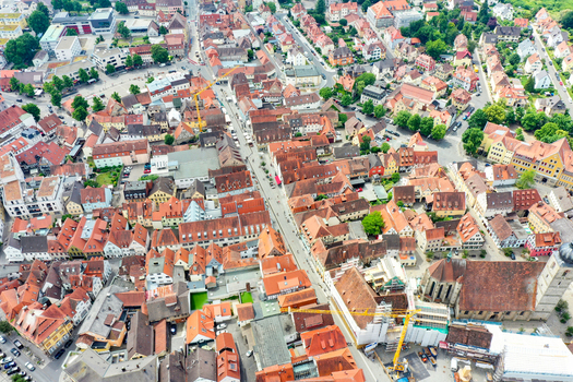 Aerial view of the historic old town featuring red tiled roofs narrow streets and the St. Martin church in Forchheim Bavaria Germany. Aerial view of the historic old town featuring red tiled roofs narrow streets and the St. Martin church in Forchheim Bavaria Germany.