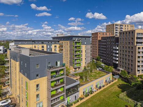 Aerial view of modern apartment buildings with balconies and green spaces at Lakeside Drive London England United Kingdom. Aerial view of modern apartment buildings with balconies and green spaces at Lakeside Drive London England United Kingdom.
