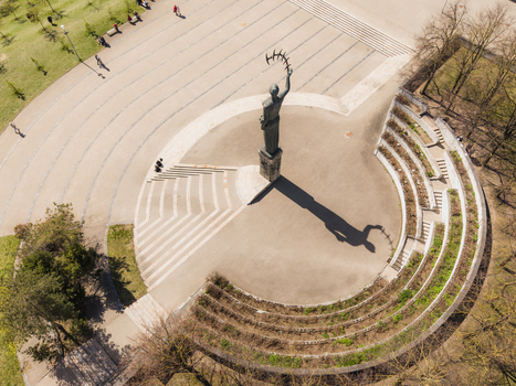 Aerial view of the Chiune Sugihara Sakura Park featuring a prominent statue circular paved plaza and terraced landscaping in Vilnius Vilniaus apskritis Lithuania. Aerial view of the Chiune Sugihara Sakura Park featuring a prominent statue circular paved plaza and terraced landscaping in Vilnius Vilniaus apskritis Lithuania.