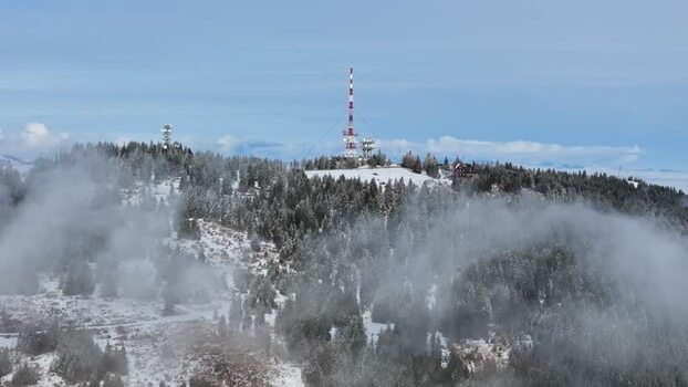 Aerial view of Schockl transmitter tower in winter Austria. Aerial view of Schockl transmitter tower in winter Austria.