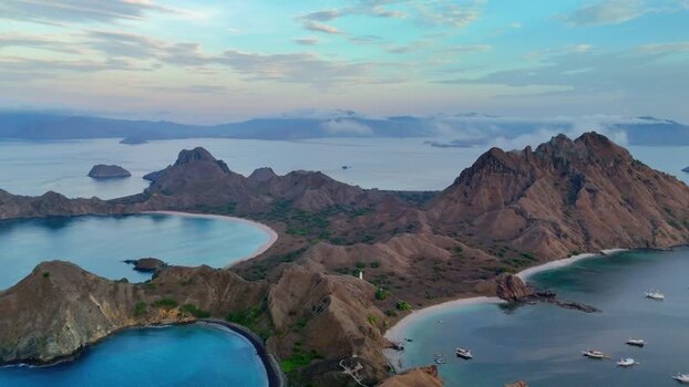Aerial view of Komodo National Park rugged hills and bays Indonesia. Aerial view of Komodo National Park rugged hills and bays Indonesia.