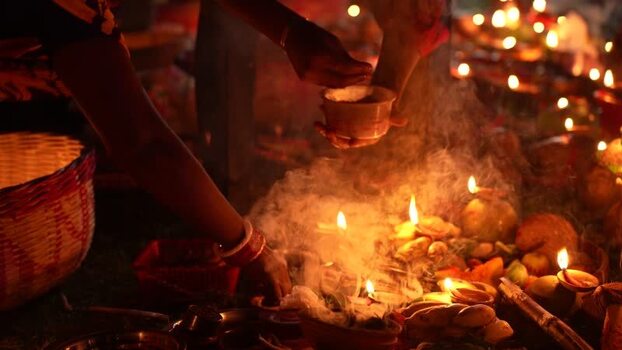 View of people lighting oil lamps during a festival Bangladesh. View of people lighting oil lamps during a festival Bangladesh.