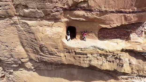 Aerial view of people at the Abune Yemata rock hewn church Ethiopia. Aerial view of people at the Abune Yemata rock hewn church Ethiopia.