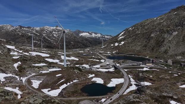 Aerial view of wind turbines and Gotthard Pass Switzerland. Aerial view of wind turbines and Gotthard Pass Switzerland.