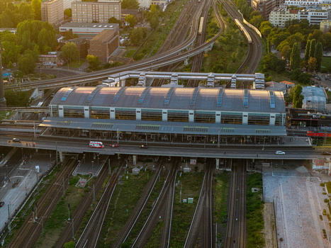Aerial view of Ostkreuz train station featuring complex railway tracks platforms and urban infrastructure in Berlin Berlin Germany. Aerial view of Ostkreuz train station featuring complex railway tracks platforms and urban infrastructure in Berlin Berlin Germany.