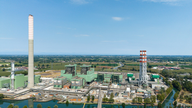 Aerial view of the Tavazzano power station a modern combined cycle natural gas plant with tall chimneys and industrial infrastructure in Tavazzano con Villavesco Lombardy Italy.