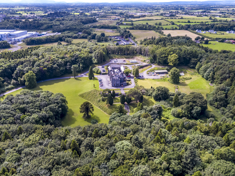 Ballina Ireland 25 September 2026 Aerial view of Belleek Castle Hotel surrounded by lush green woodlands manicured lawns and winding paths in County Mayo. Ballina Ireland 25 September 2026 Aerial view of Belleek Castle Hotel surrounded by lush green woodlands manicured lawns and winding paths in County Mayo.