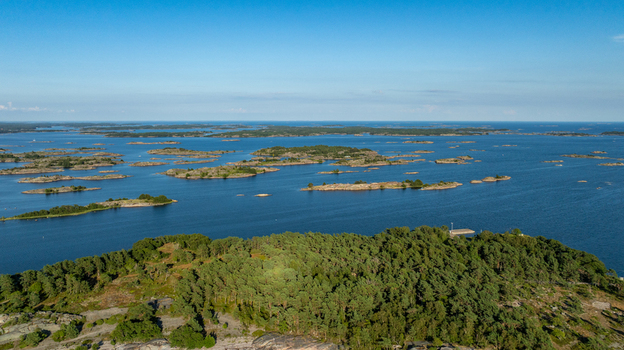 Aerial view of Oro Fortress Island in the Baltic Sea archipelago featuring dense pine forests rocky coastlines and small islands in Oro Varsinais Suomi Finland. Aerial view of Oro Fortress Island in the Baltic Sea archipelago featuring dense pine forests rocky coastlines and small islands in Oro Varsinais Suomi Finland.