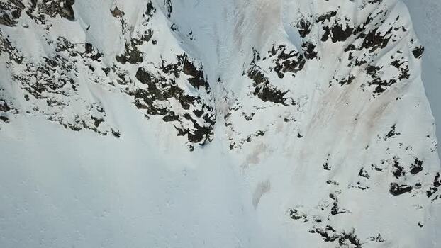 Aerial view of snowy mountain slopes in Baqueira Spain.